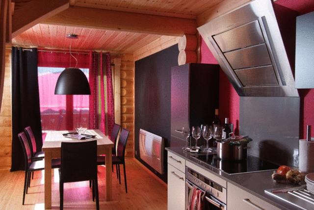 Kuchyň nebo kuchyňský kout v ubytování Chalet Ana & SPA