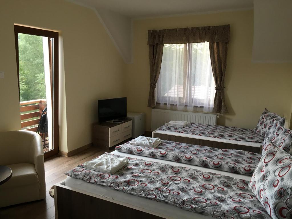Letto o letti in una camera di Farkas Panzió