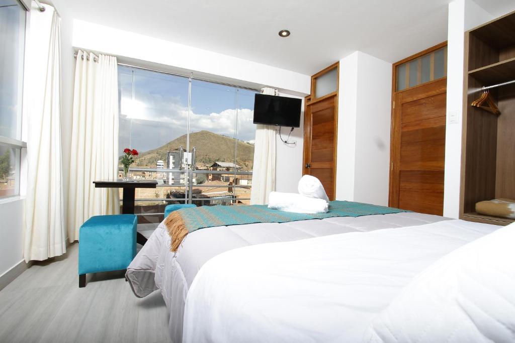 Nespecifikovaný výhled na hory nebo výhled na hory při pohledu z aparthotelu