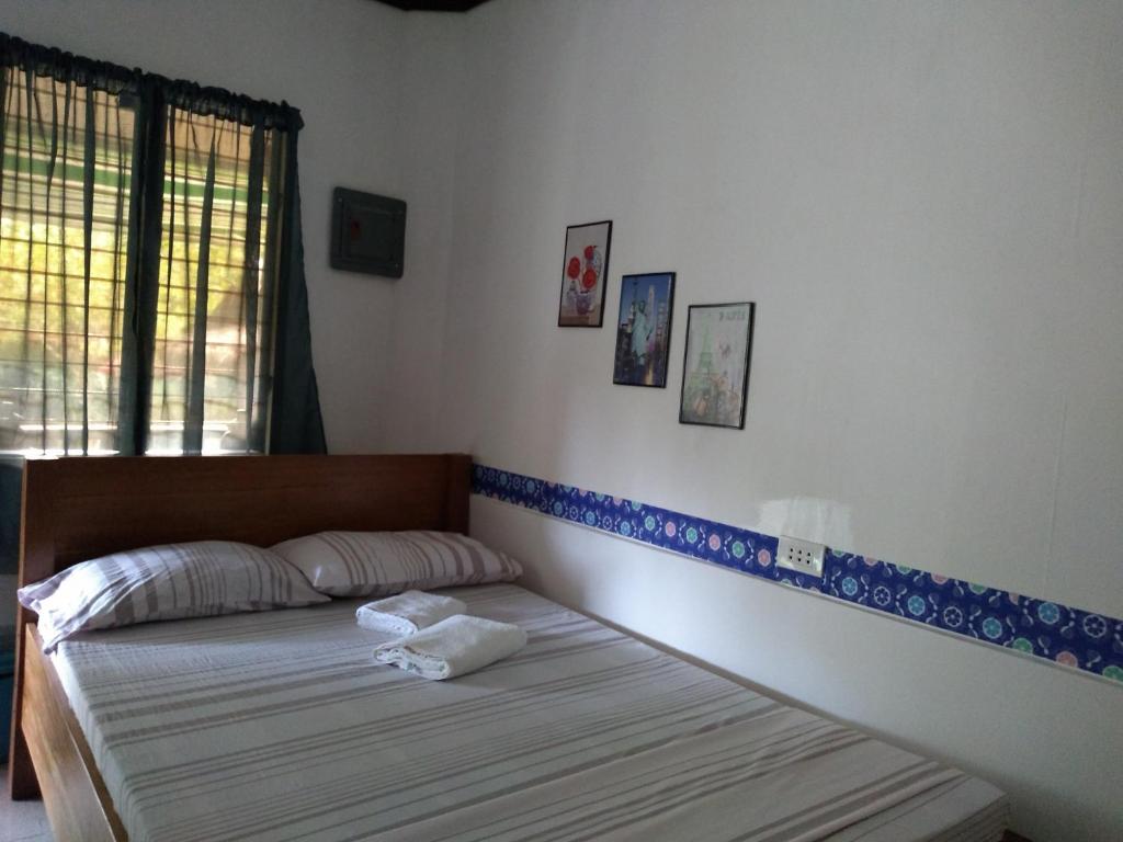 Postel nebo postele na pokoji v ubytování Enna's Place