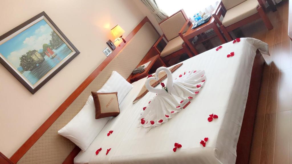 Postel nebo postele na pokoji v ubytování Paradis Hotel