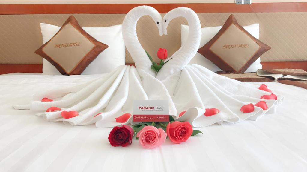 Postel nebo postele na pokoji v ubytování Paradis Hotel