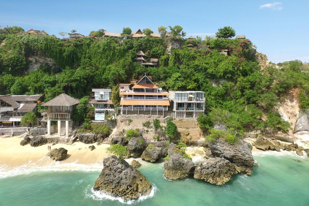 an aerial view of a resort on a beach at Impossible Cliff House in Uluwatu