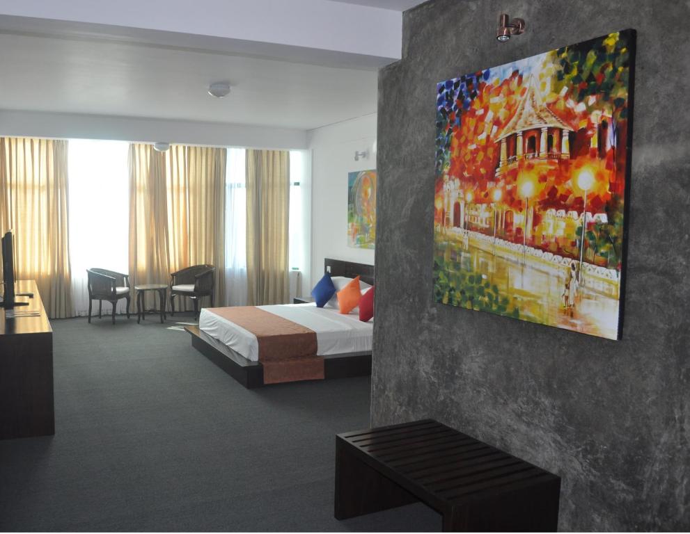 Postel nebo postele na pokoji v ubytování Amaara Sky Hotel Kandy