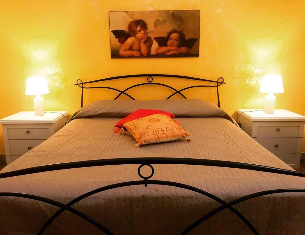 Postel nebo postele na pokoji v ubytování La Dimora di Ermes
