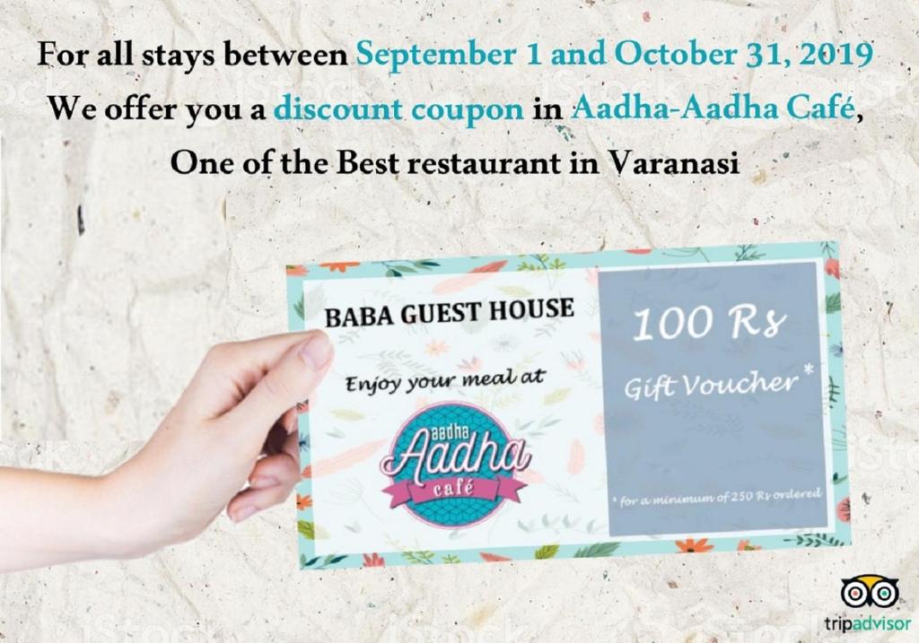 un folleto para un cupón de descuento en la cafetería aaa australia en Baba Guest House, en Varanasi