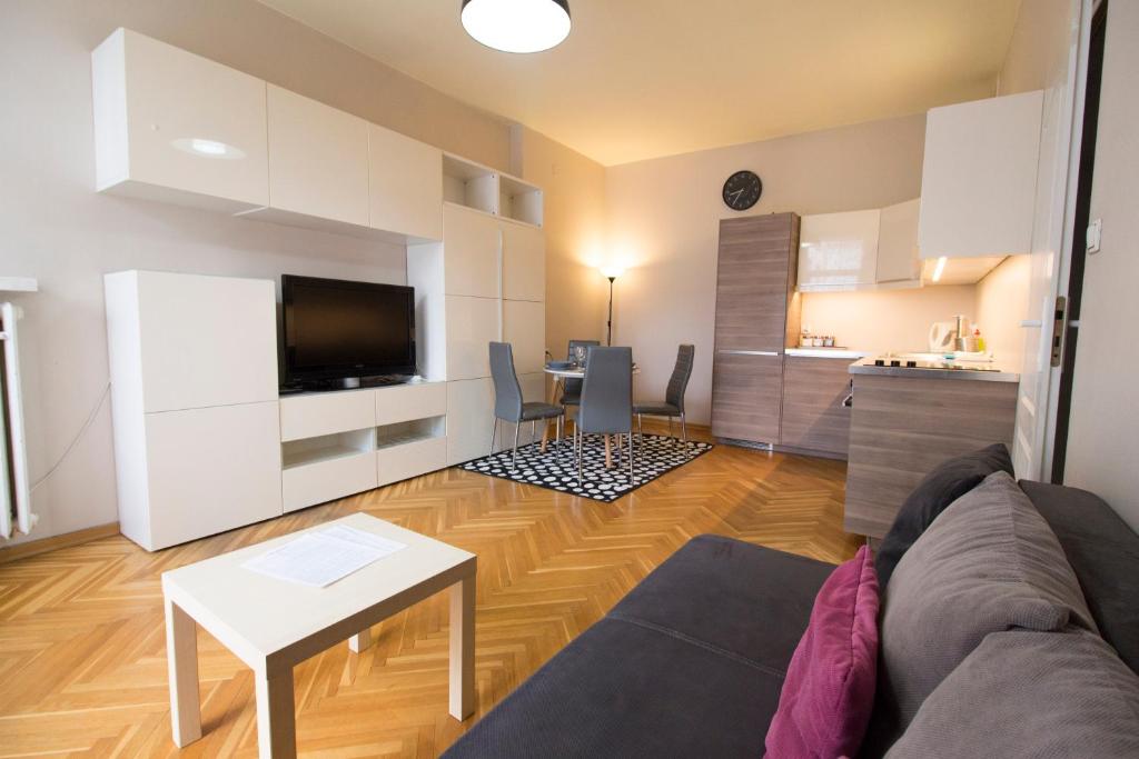 Televízia a/alebo spoločenská miestnosť v ubytovaní LUCKY APARTMENTS - Świdnicka Old Town