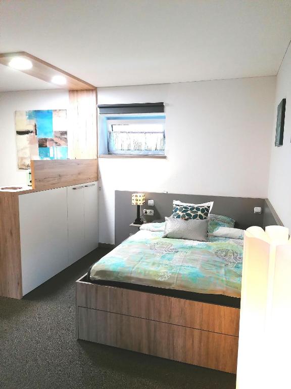 Posteľ alebo postele v izbe v ubytovaní Business Apartments