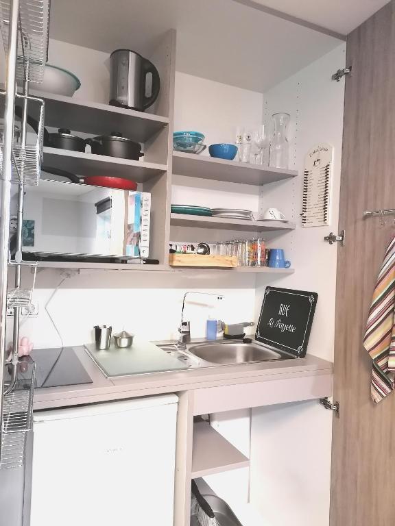 Kuchyňa alebo kuchynka v ubytovaní Business Apartments