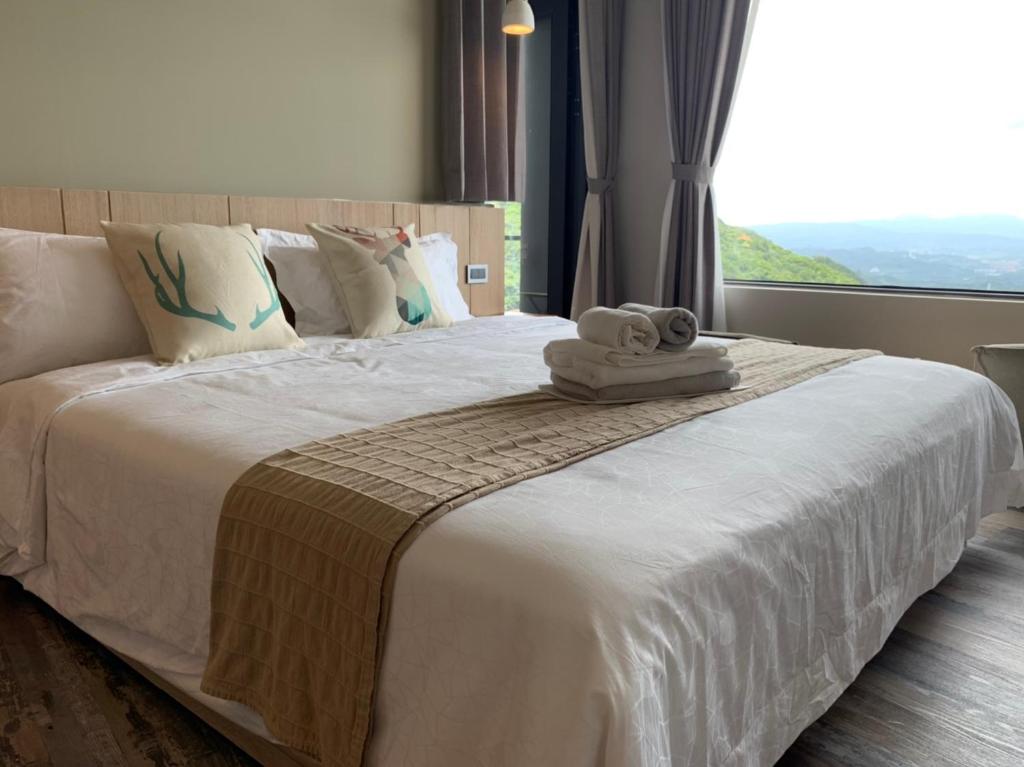 Postel nebo postele na pokoji v ubytování Two Easy Inn