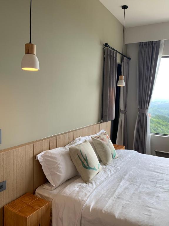 Postel nebo postele na pokoji v ubytování Two Easy Inn