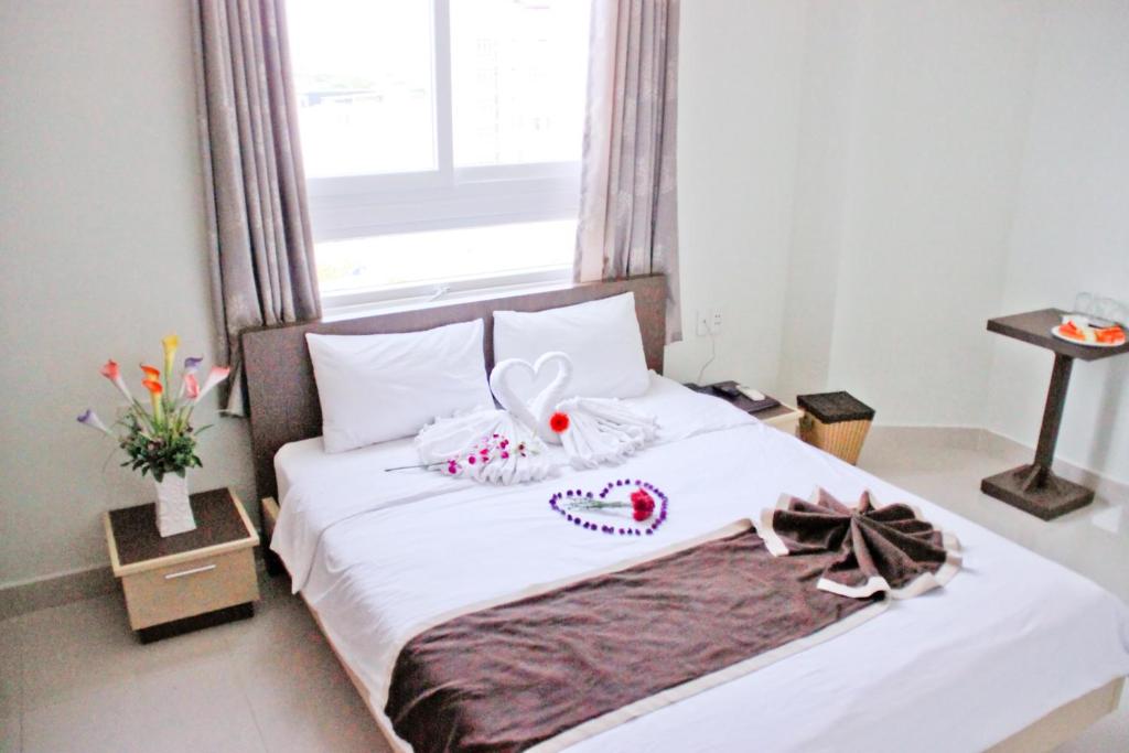 Postel nebo postele na pokoji v ubytování Princess Hotel