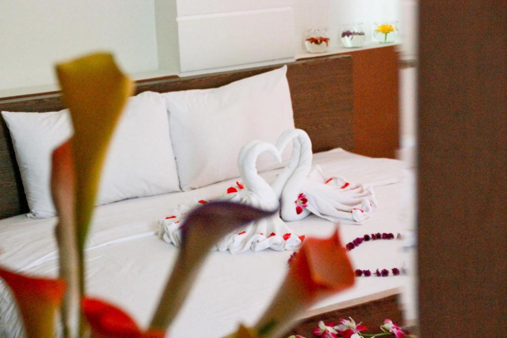 Postel nebo postele na pokoji v ubytování Princess Hotel