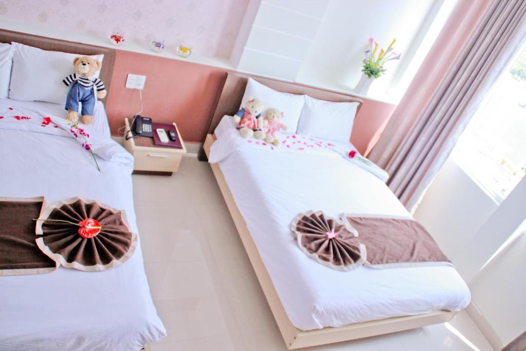 Postel nebo postele na pokoji v ubytování Princess Hotel