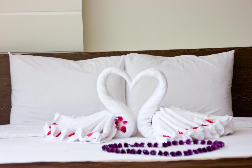 Postel nebo postele na pokoji v ubytování Princess Hotel