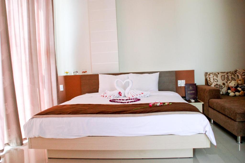 Postel nebo postele na pokoji v ubytování Princess Hotel