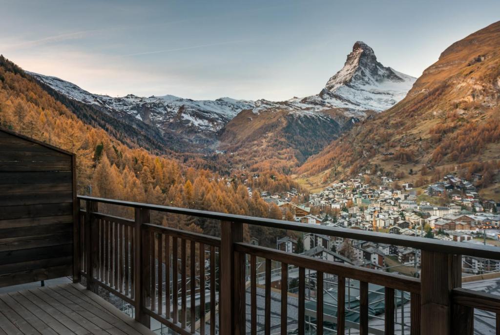 a balcony with a view of a mountain at Chalet Luna in Zermatt