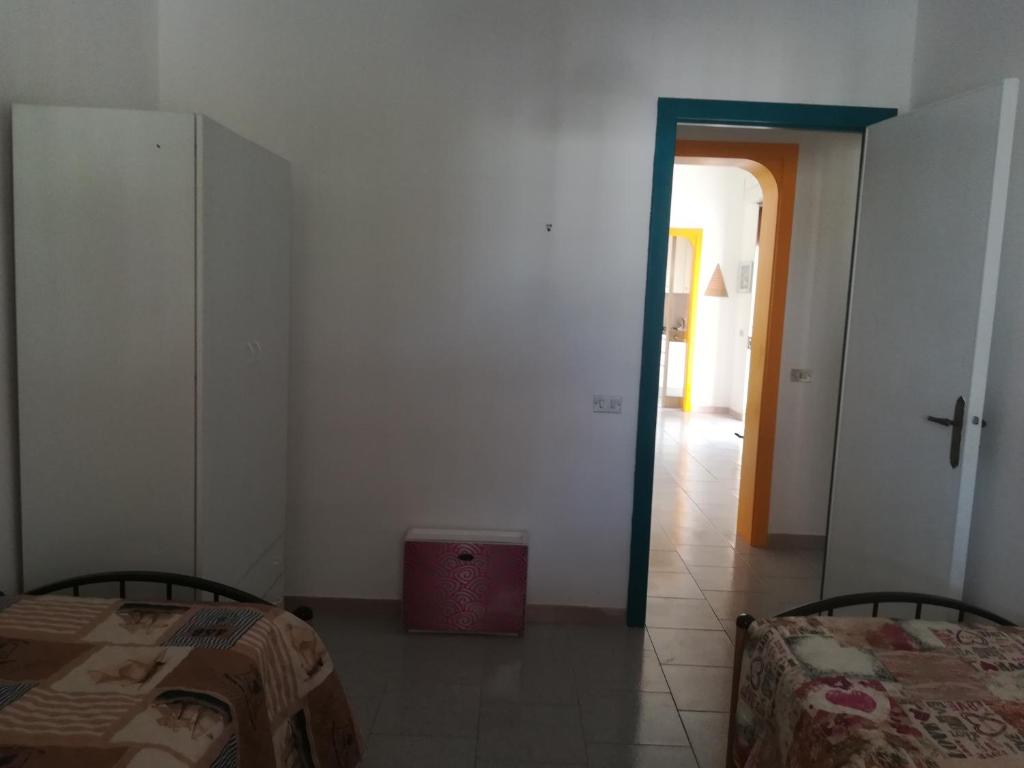 Posteľ alebo postele v izbe v ubytovaní Casa Letizia