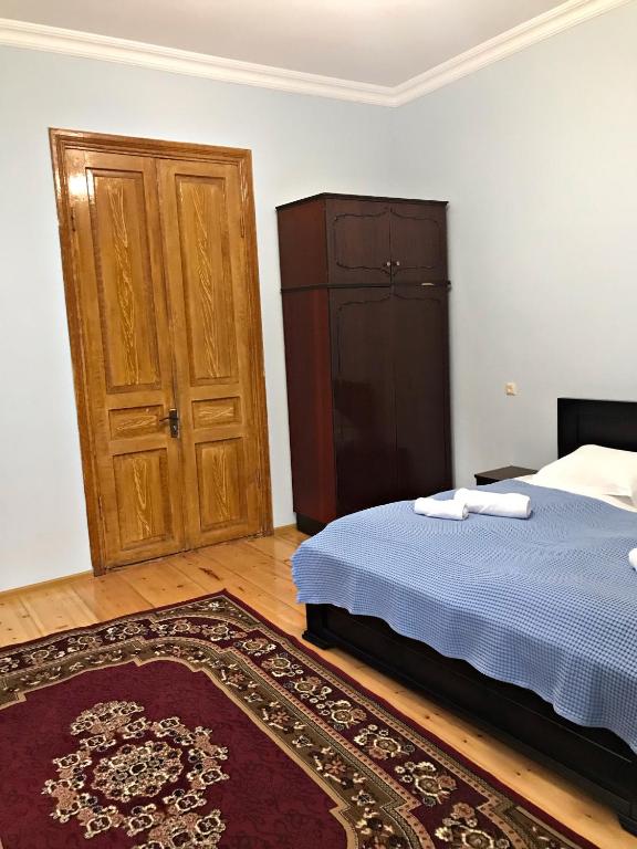 Postel nebo postele na pokoji v ubytování Season