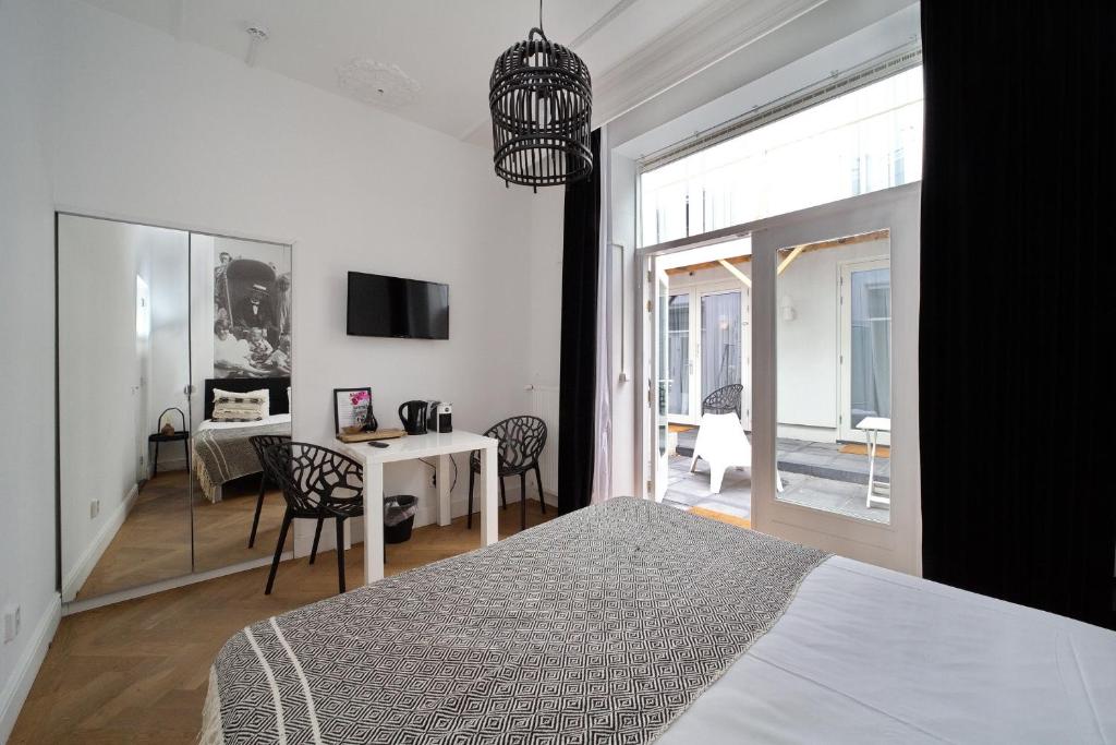 Postel nebo postele na pokoji v ubytování Hotel Zeespiegel