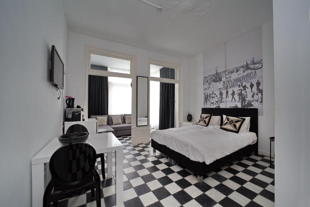 Postel nebo postele na pokoji v ubytování Hotel Zeespiegel