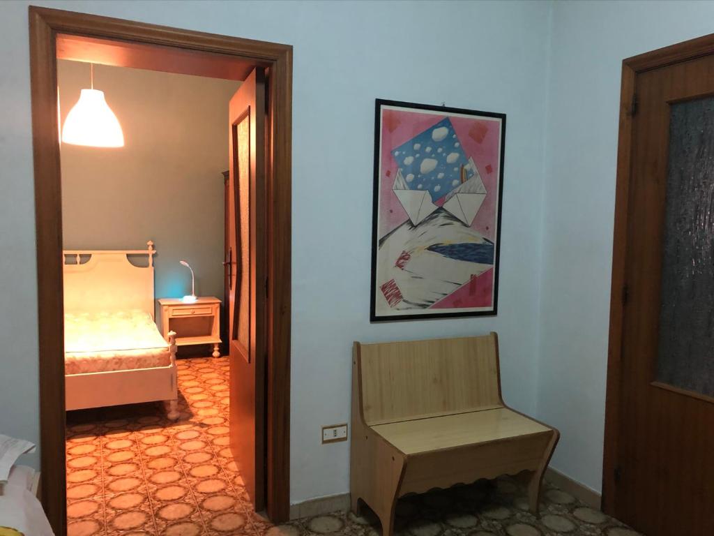 Łóżko lub łóżka w pokoju w obiekcie La Casa Di Lina