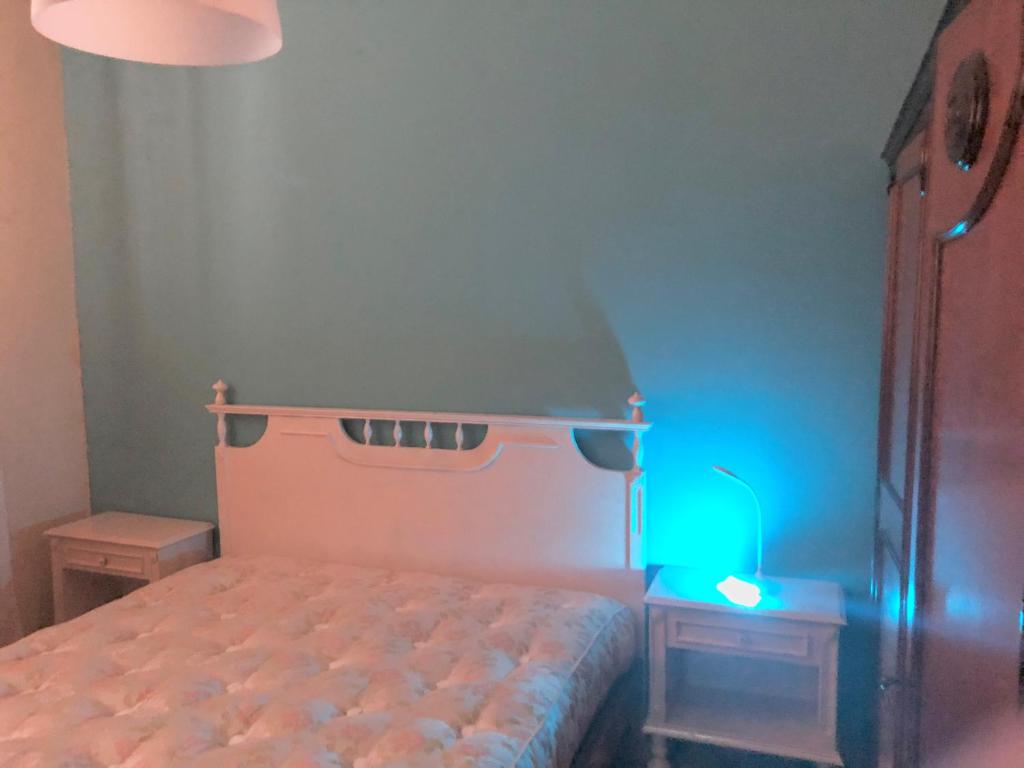Łóżko lub łóżka w pokoju w obiekcie La Casa Di Lina
