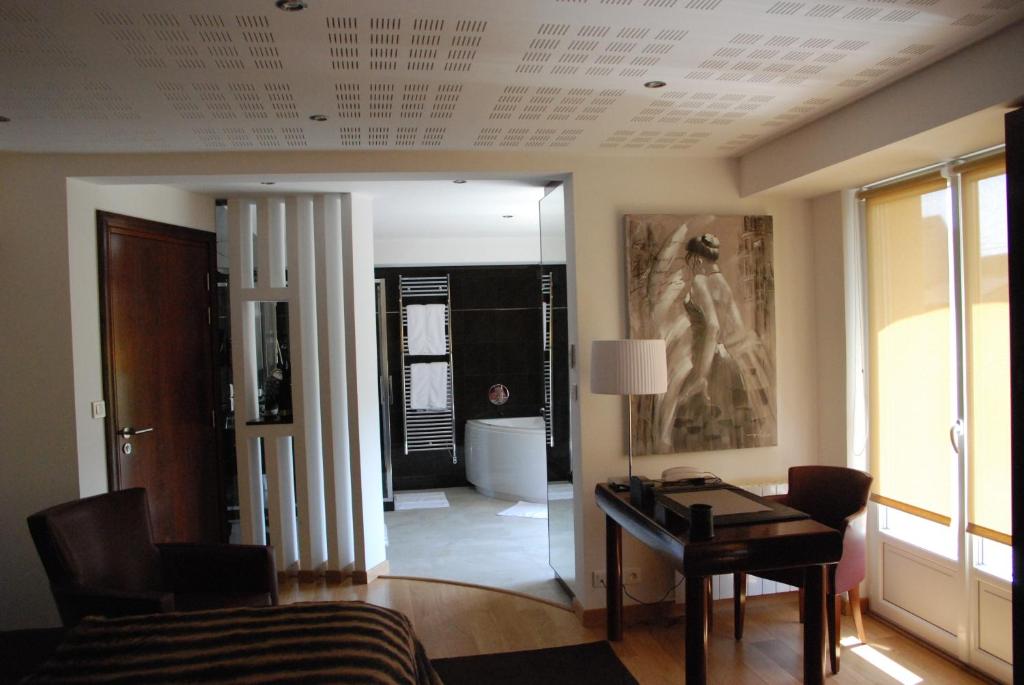 Posezení v ubytování Hôtel Ariane & SPA