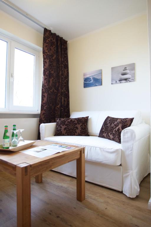 Posezení v ubytování Das Frühstückshotel Sankt Peter-Ording