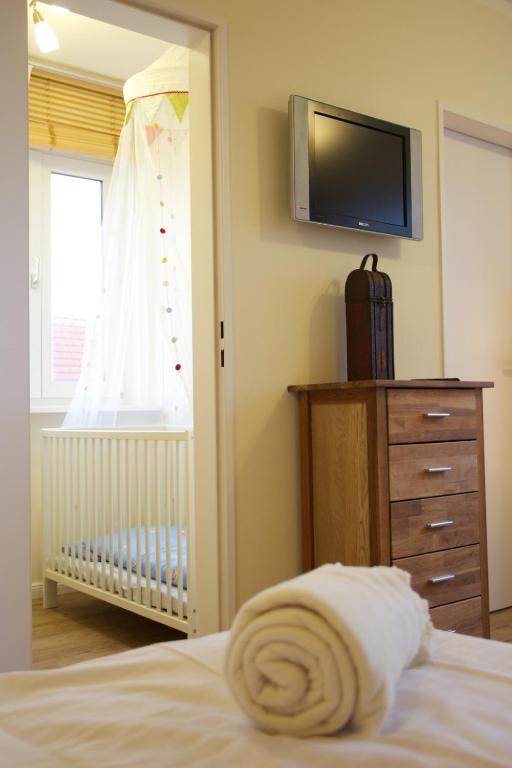 Postel nebo postele na pokoji v ubytování Das Frühstückshotel Sankt Peter-Ording