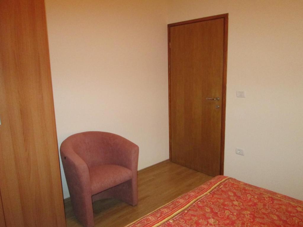 Postel nebo postele na pokoji v ubytování Apartments Villa Fernetich