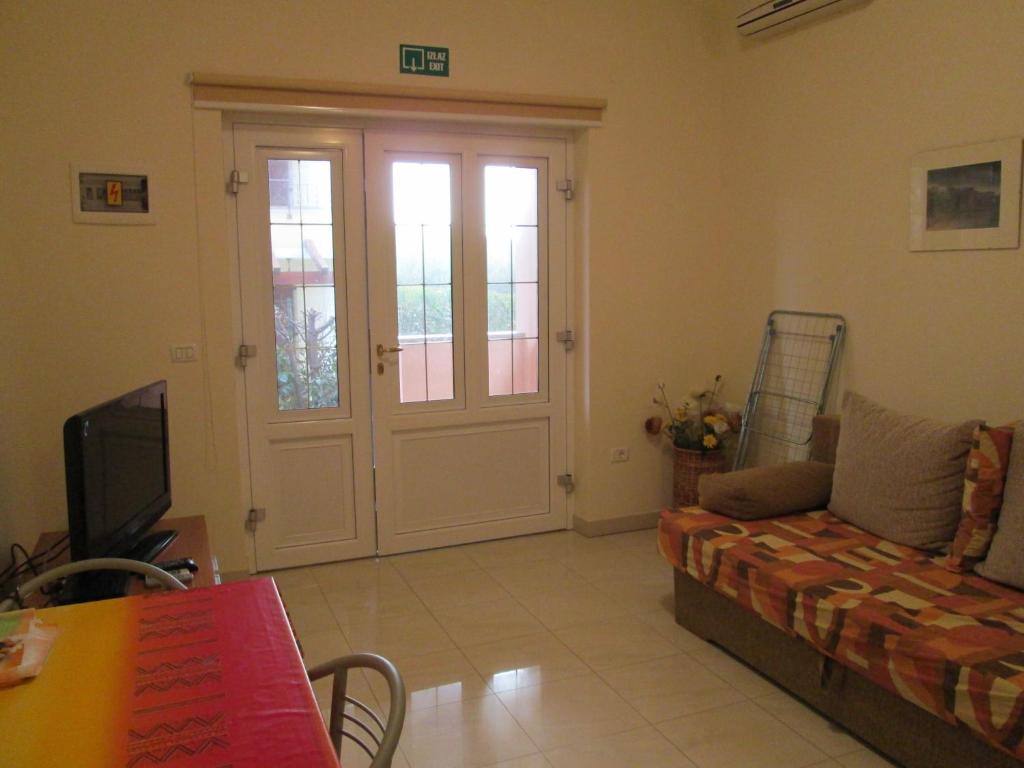 TV a/nebo společenská místnost v ubytování Apartments Villa Fernetich