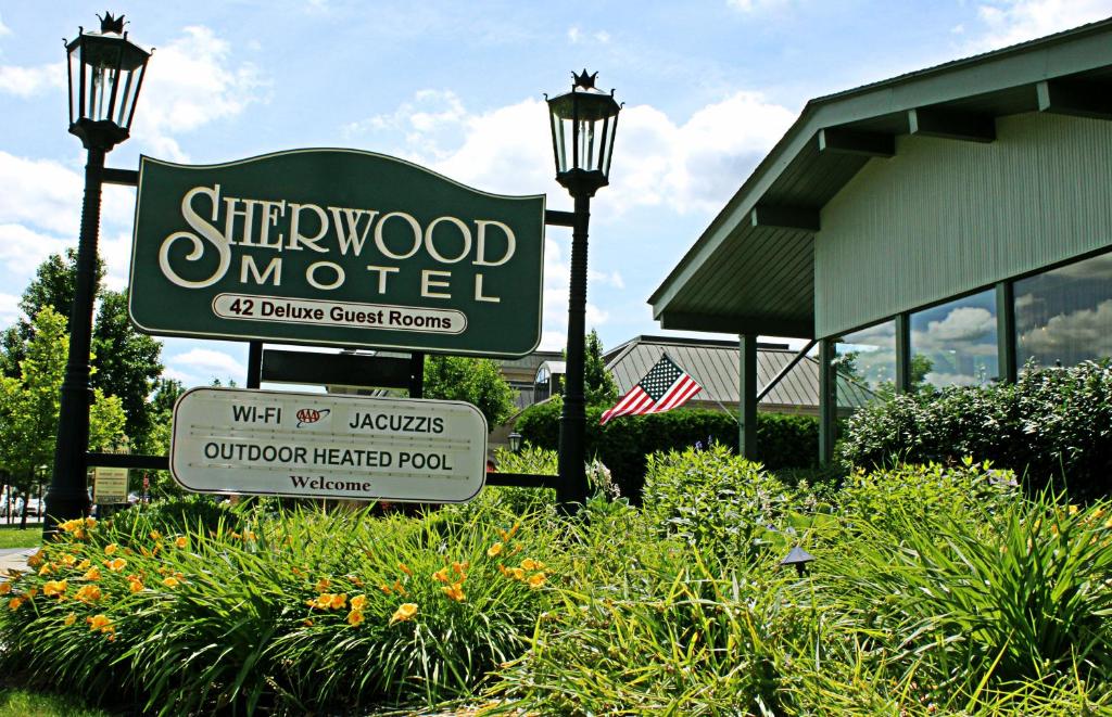 a sign for a sherwood motel in front of a building at SHERWOOD MOTEL in Wellsboro