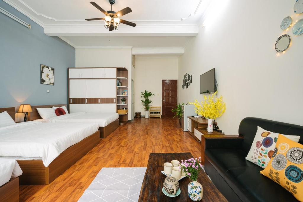Postel nebo postele na pokoji v ubytování Hanoi Crocus Homestay