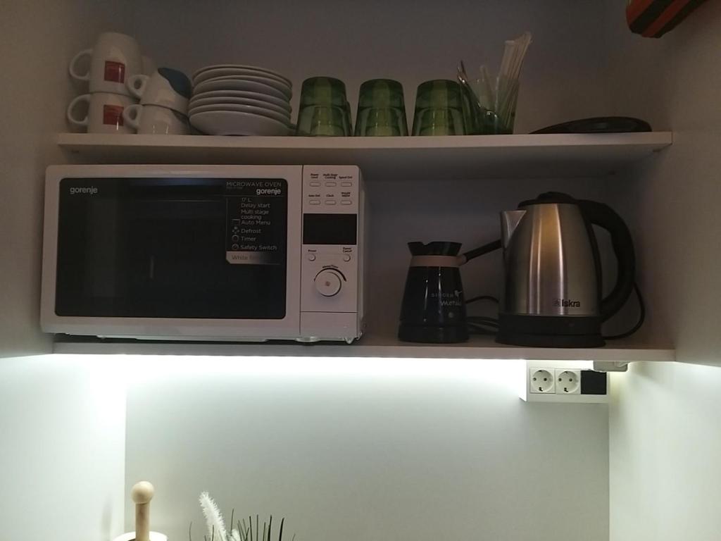 Kuchyň nebo kuchyňský kout v ubytování Centralcityrooms