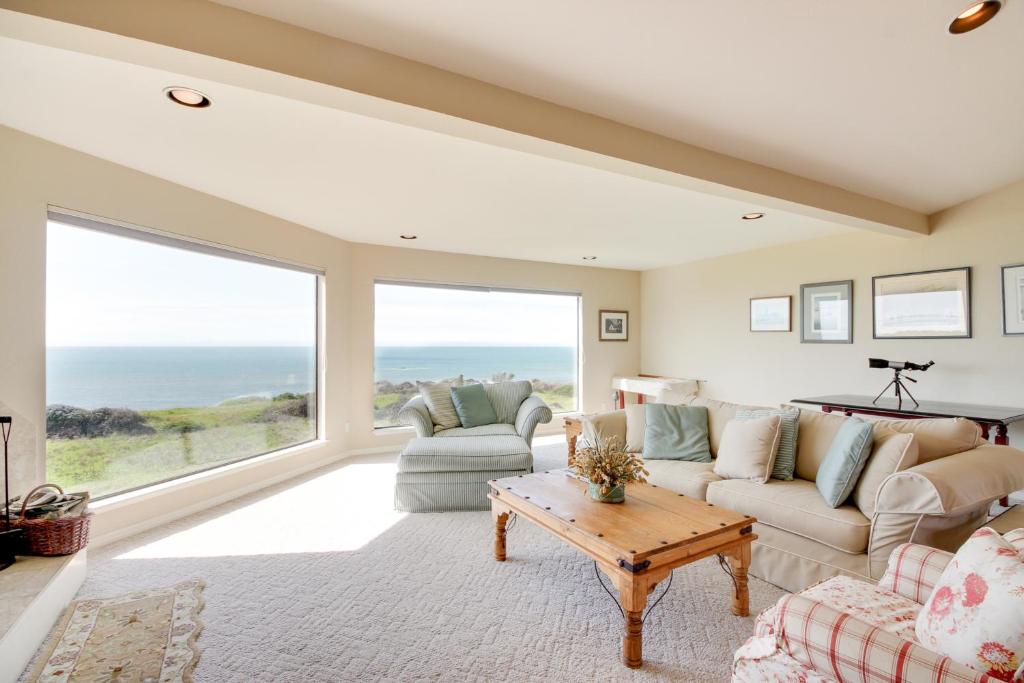 a living room with a view of the ocean at Levy Retreat in Sea Ranch