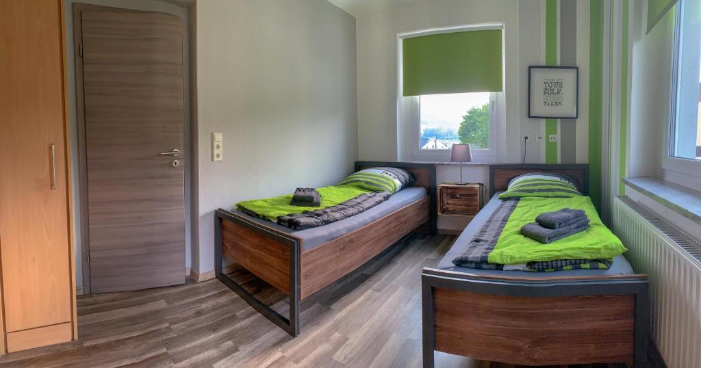Postel nebo postele na pokoji v ubytování Ferienwohnung Herold