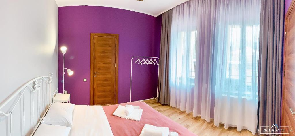 Postel nebo postele na pokoji v ubytování Belmonte Kazbegi