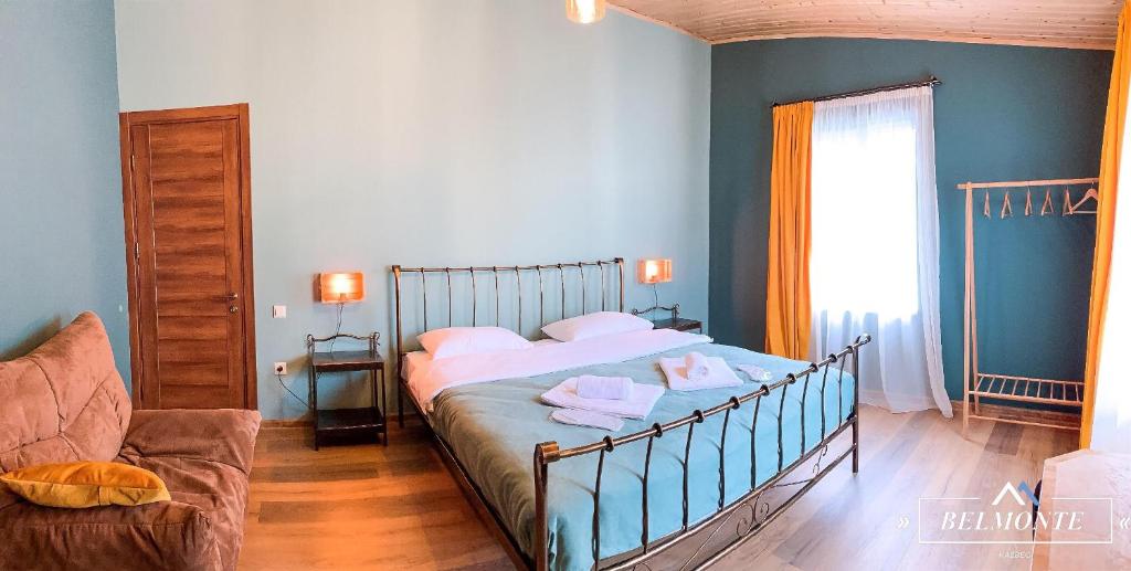 Postel nebo postele na pokoji v ubytování Belmonte Kazbegi