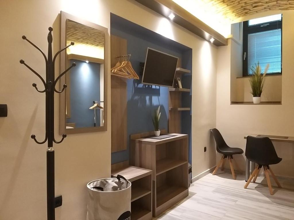 TV a/nebo společenská místnost v ubytování Centralcityrooms