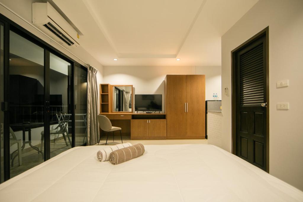 TV a/nebo společenská místnost v ubytování Nalanta Hotel Pattaya