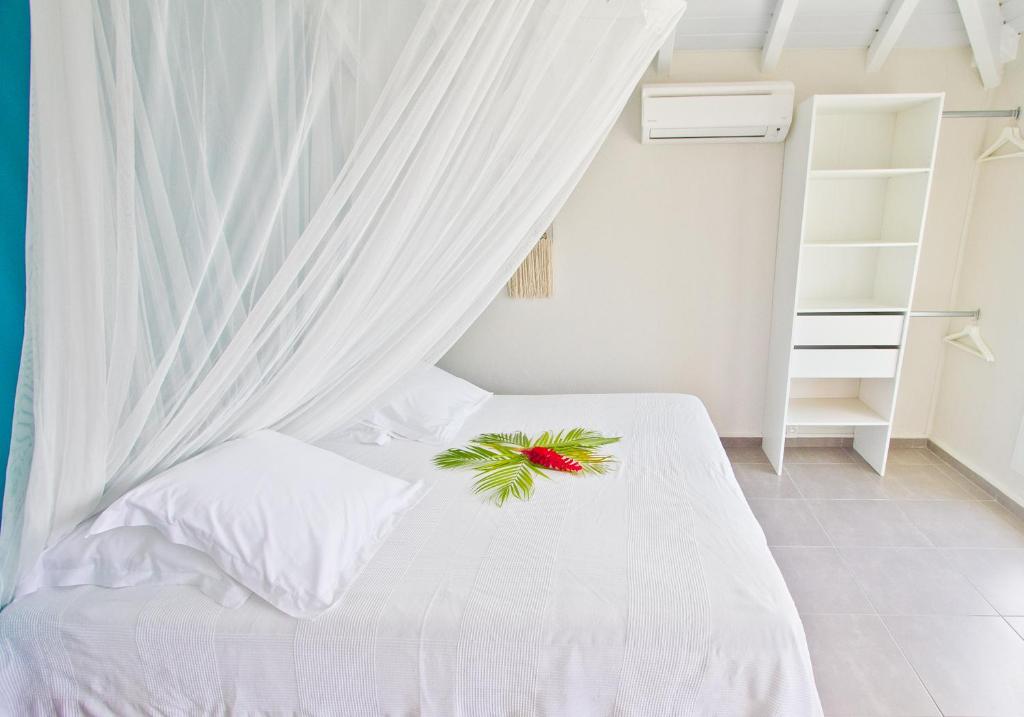 Postel nebo postele na pokoji v ubytování Appartement Duplex Vue Mer Jacuzzi Privé