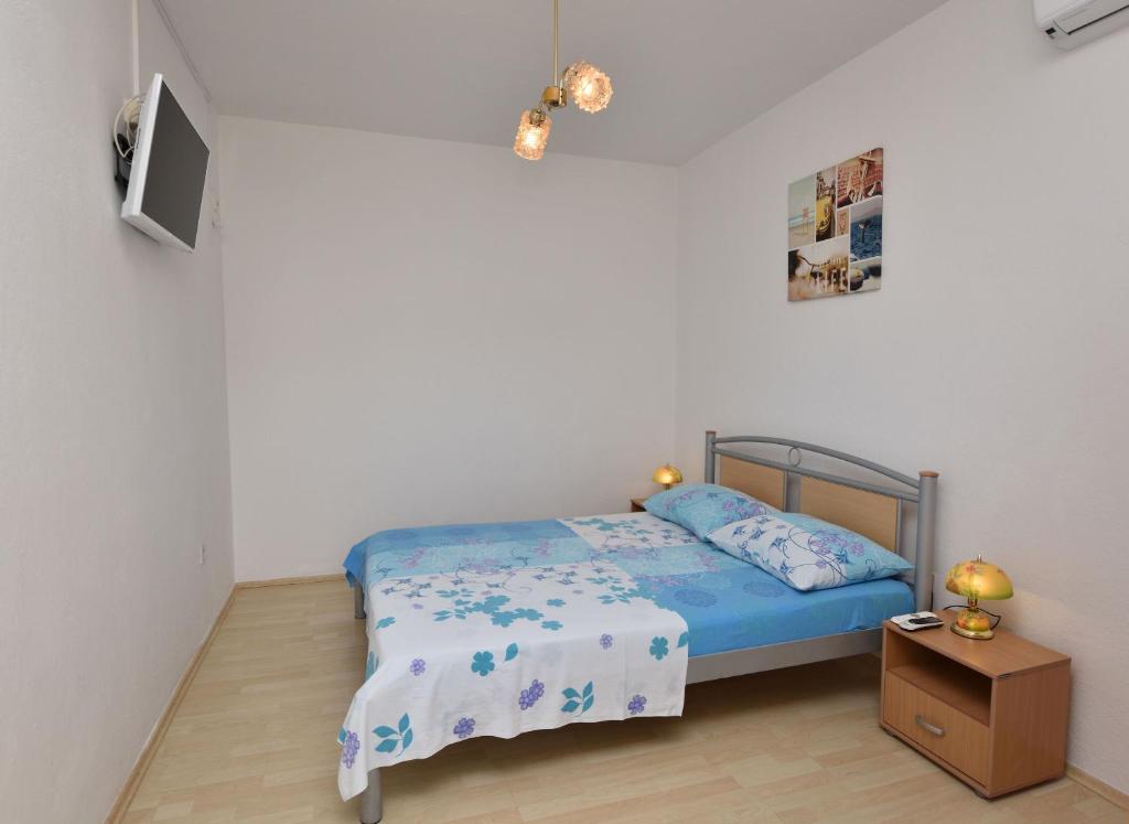 Posteľ alebo postele v izbe v ubytovaní Apartment Dijo I