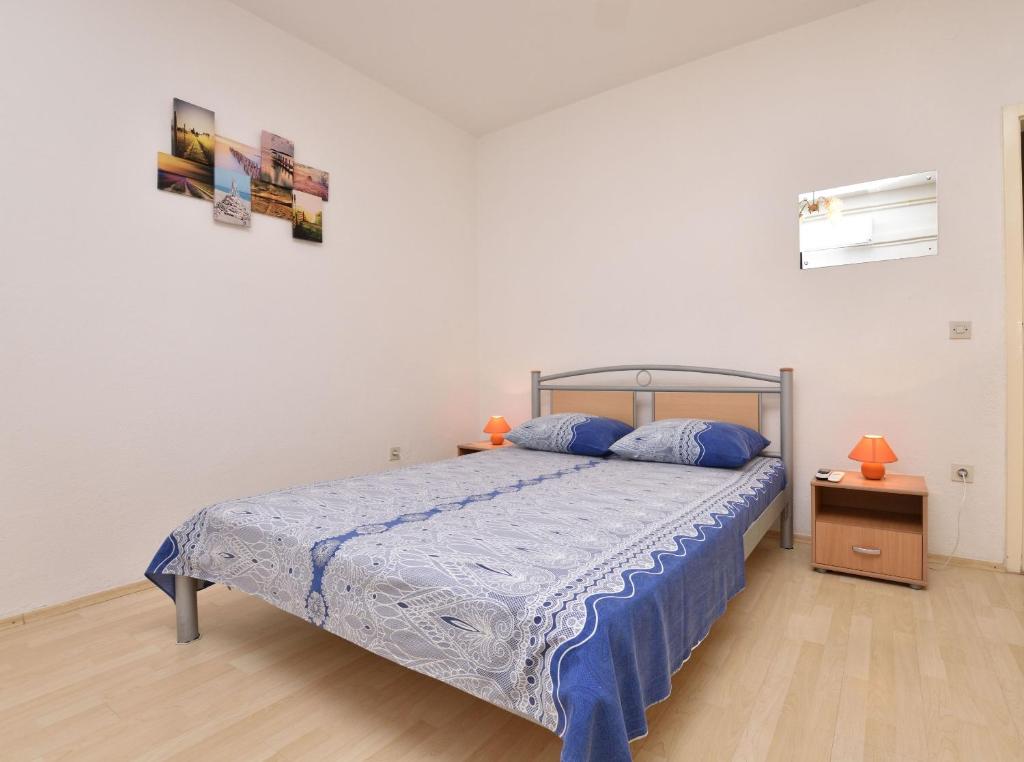 Posteľ alebo postele v izbe v ubytovaní Apartment Dijo I