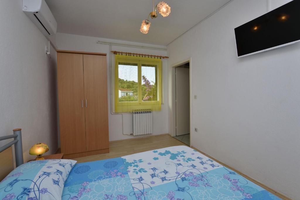 Posteľ alebo postele v izbe v ubytovaní Apartment Dijo I