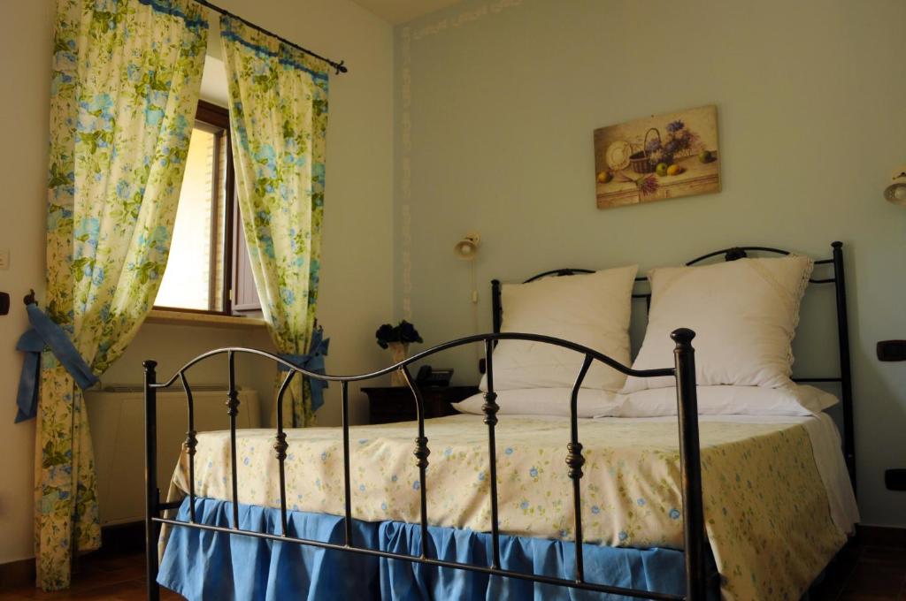Posteľ alebo postele v izbe v ubytovaní Tenuta Bellaprima CALTAGIRONE