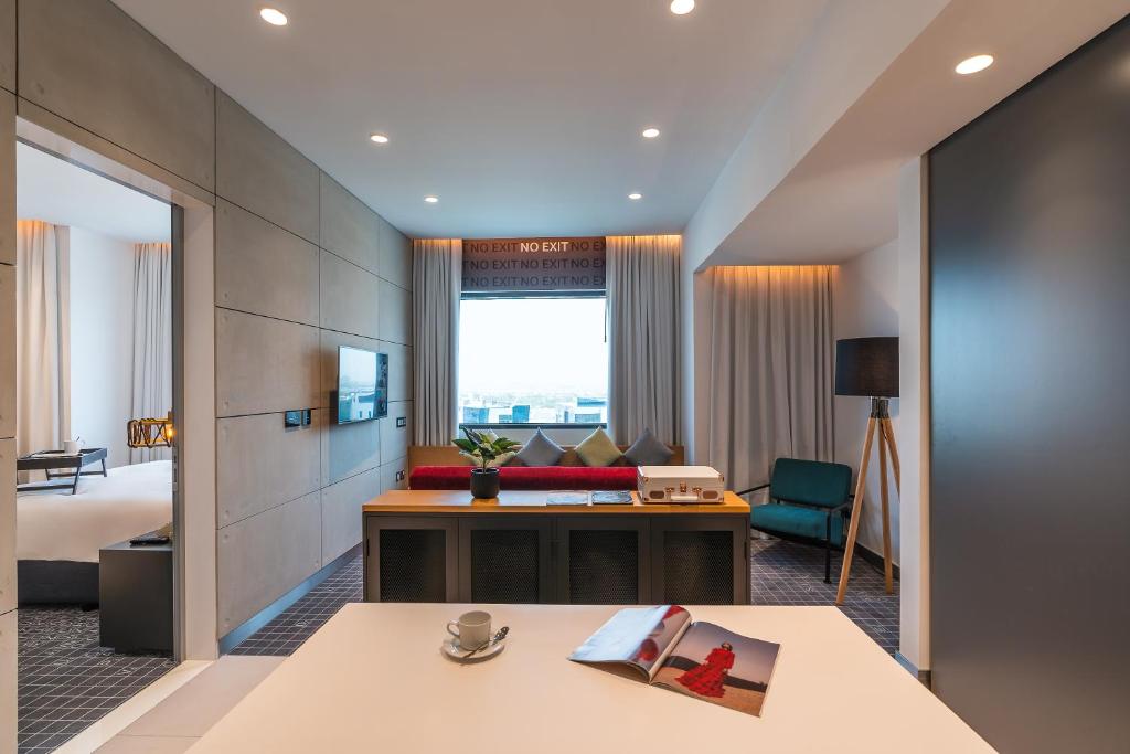 Posezení v ubytování Studio One Hotel