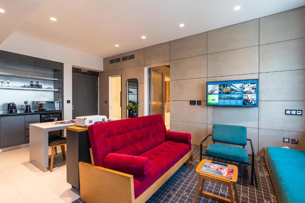 Kuchyň nebo kuchyňský kout v ubytování Studio One Hotel