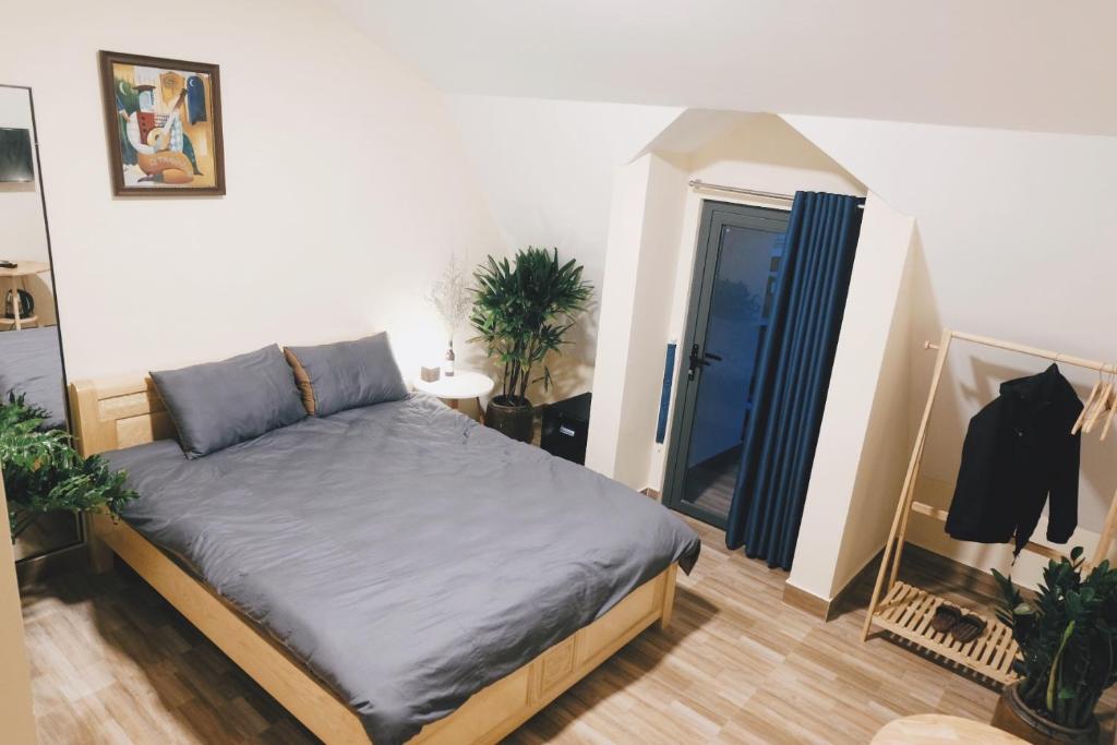 Ένα ή περισσότερα κρεβάτια σε δωμάτιο στο PoWill Home