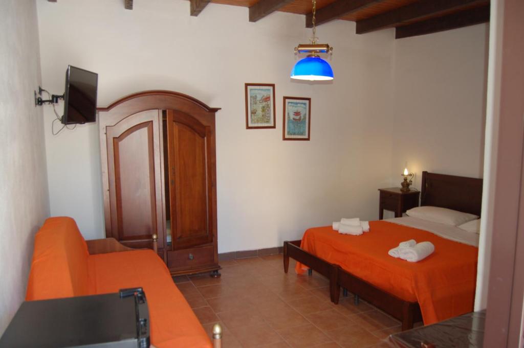 Postel nebo postele na pokoji v ubytování Hotel Al Togo Fitness & Relax